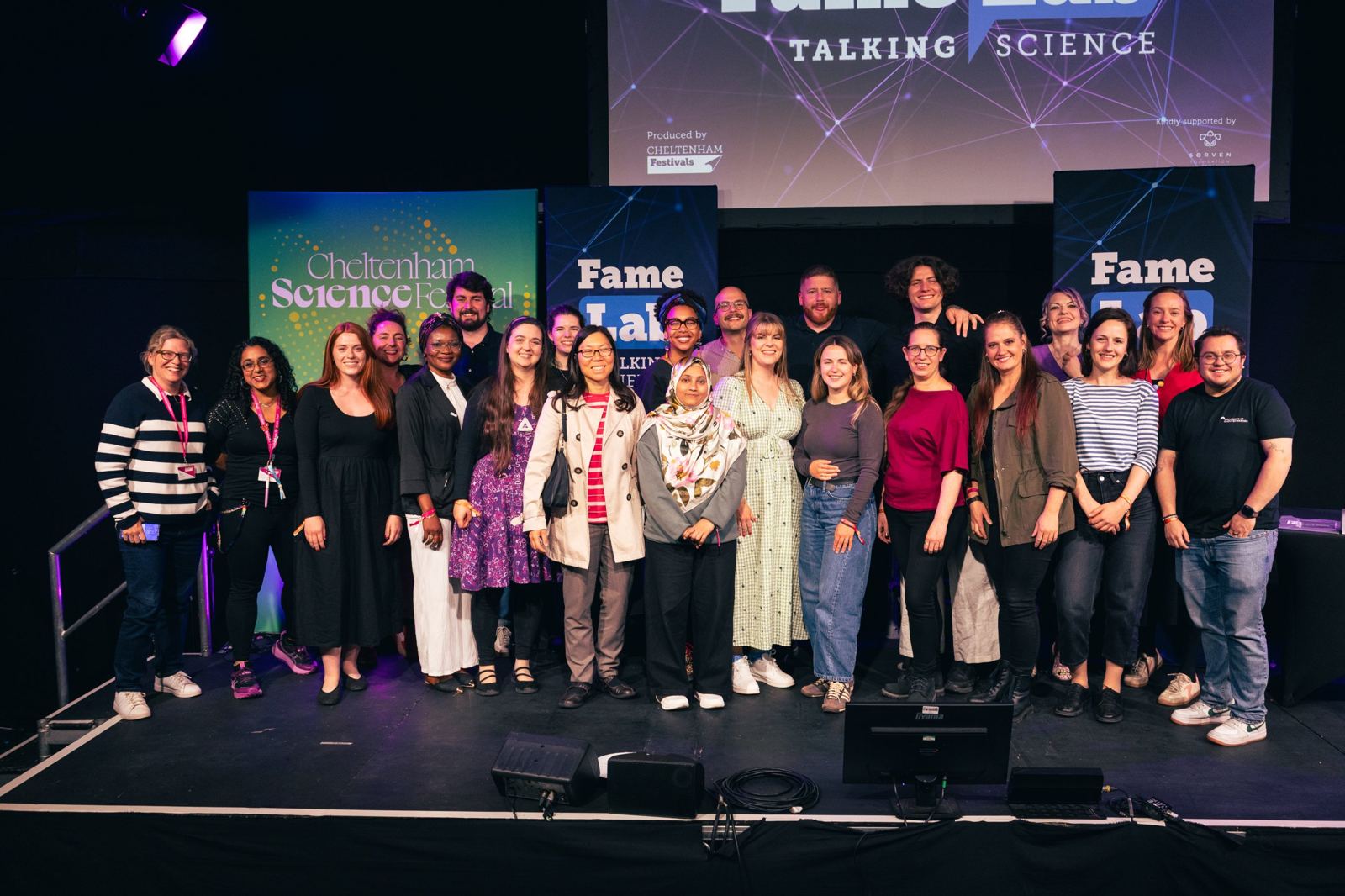 The FameLab UK 2026 finalists and organisers gathered on stage under the FameLab Talking Science screen